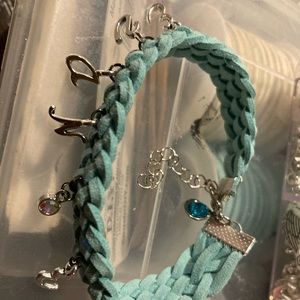 Custom bracelets any color 5 dollars plus shipping request any charm will be .50